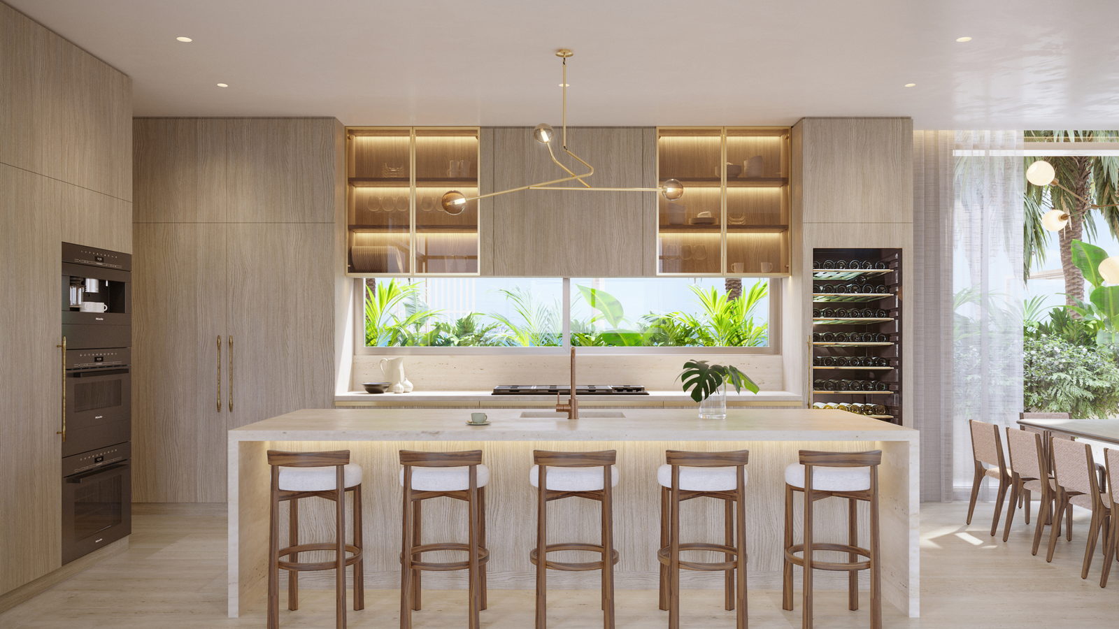 The kitchen and island, open to the dining room.